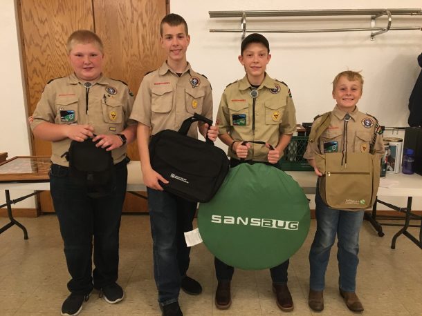 Boy Scout top sellers with their prizes.