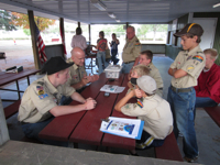 The Boy Scouts of Melrose Troop 68 learn about geocaching.
