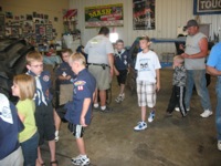 Boy Scout visit to monster truck shop. (Martial Law)